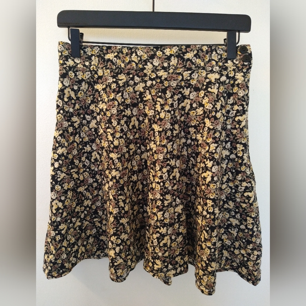 Black A line miniskirt flower pattern size 11
